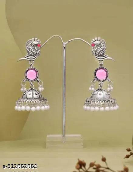 Charming oxidized silver jhumka earrings with a unique antique design and beautiful pink accents. - NARIX INDIA 